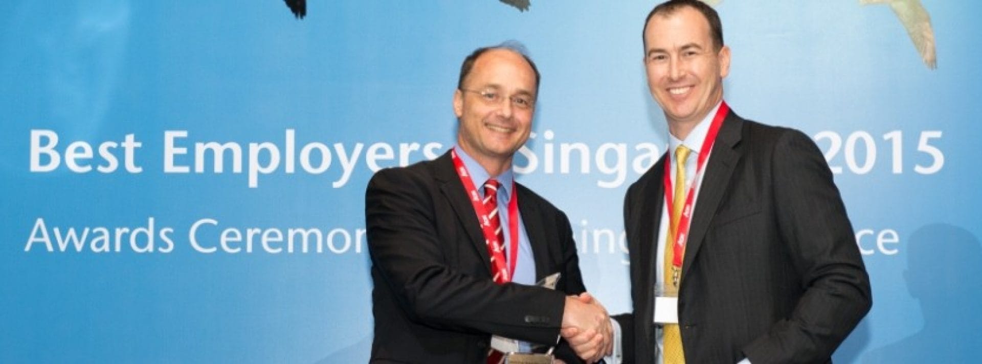 Mr. Robbert Van Der Feltz, President of Hilti Asia Pacific (left) accepting the Best Employer Award.