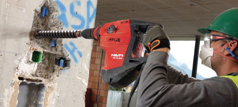 TE 70-ATC/AVR Rotary hammer Very powerful SDS Max (TE-Y) rotary hammer for heavy-duty concrete drilling and chiselling, with Active Torque Control (ATC) and Active Vibration Reduction (AVR) Applications 1